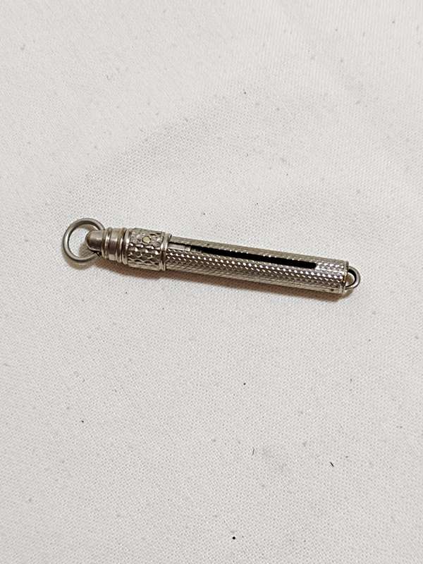 Vintage retracting button hook
