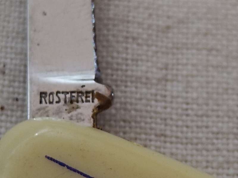 Two Advertising pocket knifes