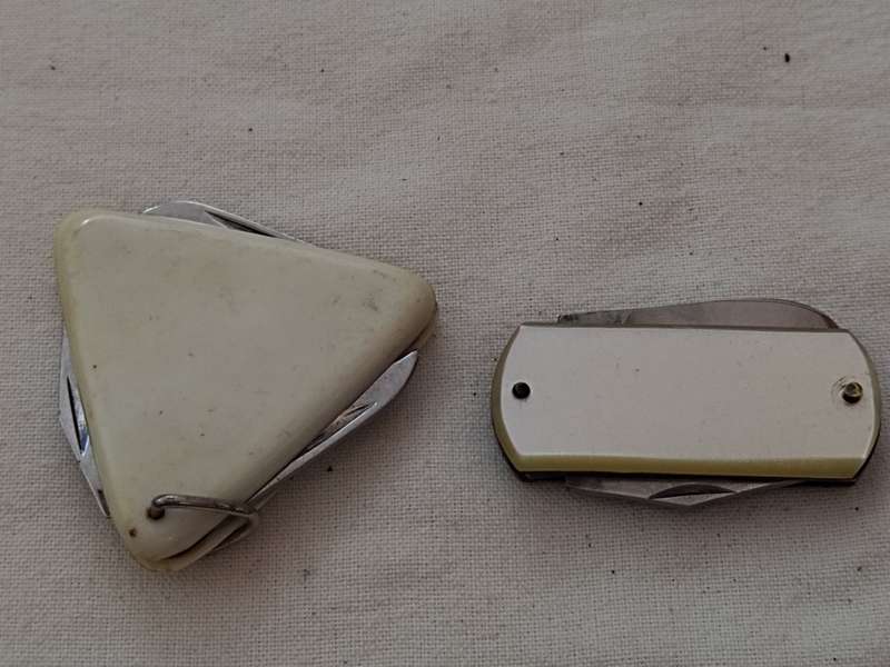 Two Advertising pocket knifes