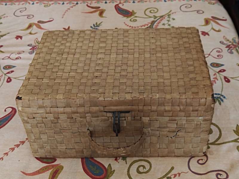 Tin Box covered outside with Bamboo and inside with news paper