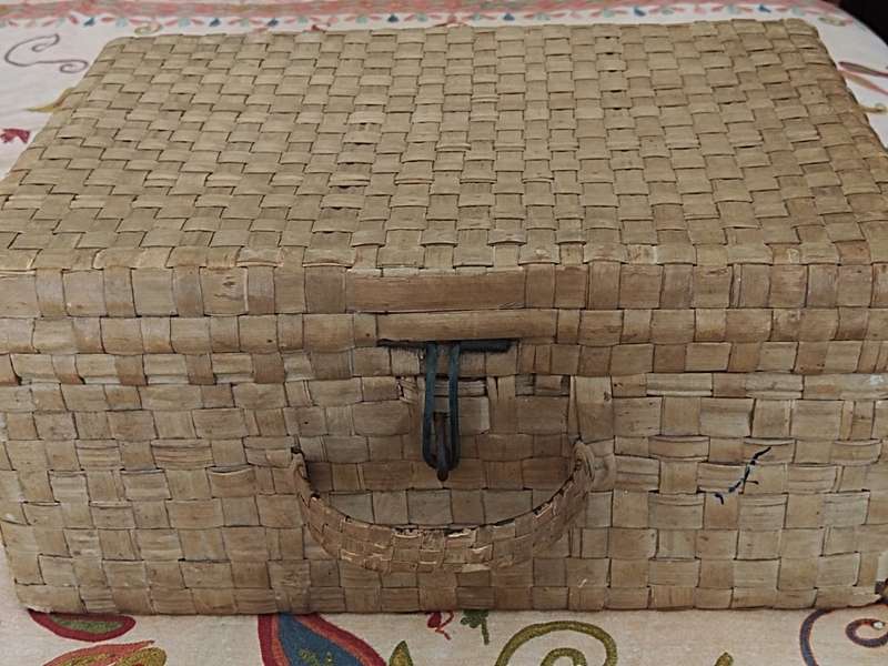 Tin Box covered outside with Bamboo and inside with news paper