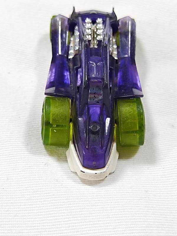 2011 HOT WHEELS DIRTY OUTLAW T9714 PURPLE DIECAST 2 3/4` CAR W/ GREEN TIRES