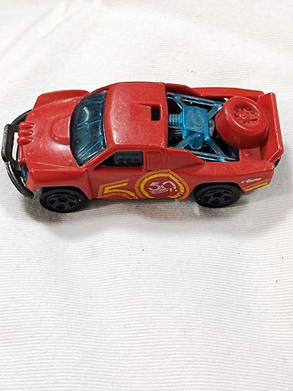 HOT WHEELS 50TH ANNIVERSARY `OFF TRACK` ~ RED WITH 50 LOGO ON SIDE