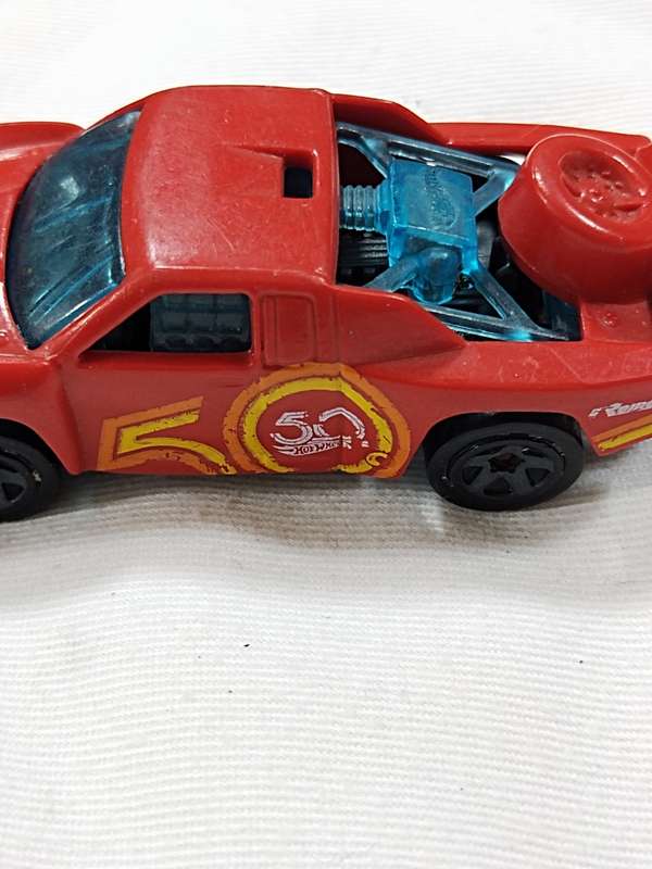 HOT WHEELS 50TH ANNIVERSARY `OFF TRACK` ~ RED WITH 50 LOGO ON SIDE