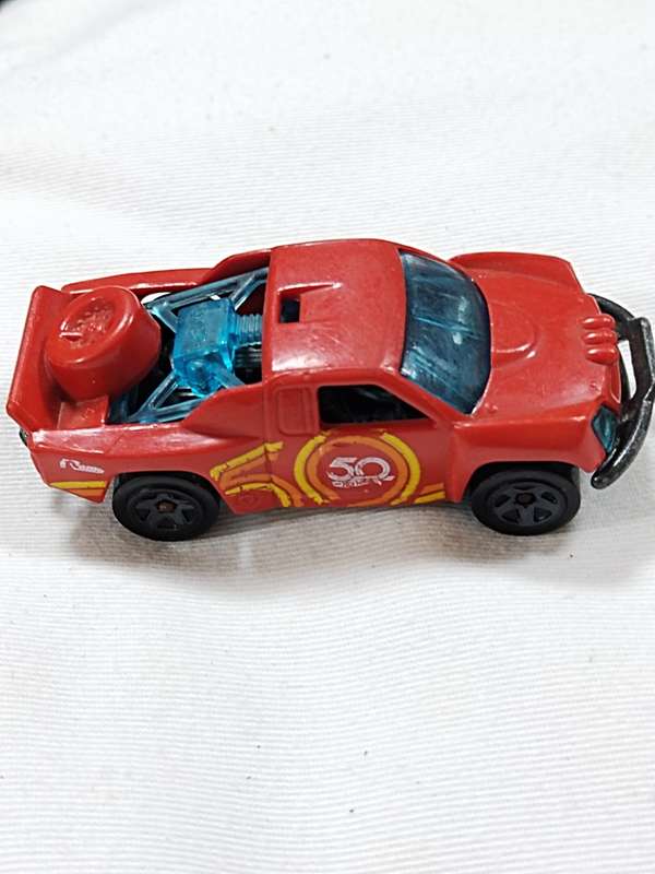 HOT WHEELS 50TH ANNIVERSARY `OFF TRACK` ~ RED WITH 50 LOGO ON SIDE