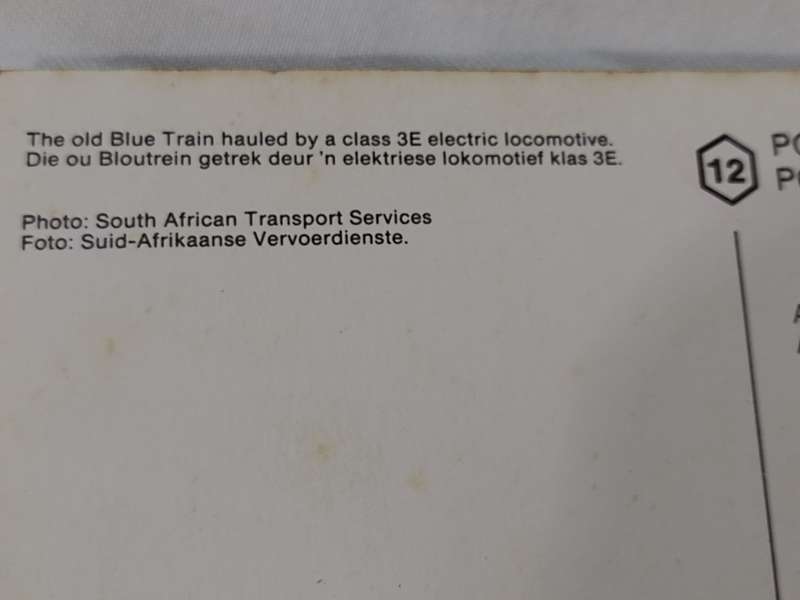 The old Blue Train hauled by a Class 3E electric locomotive. Postcard
