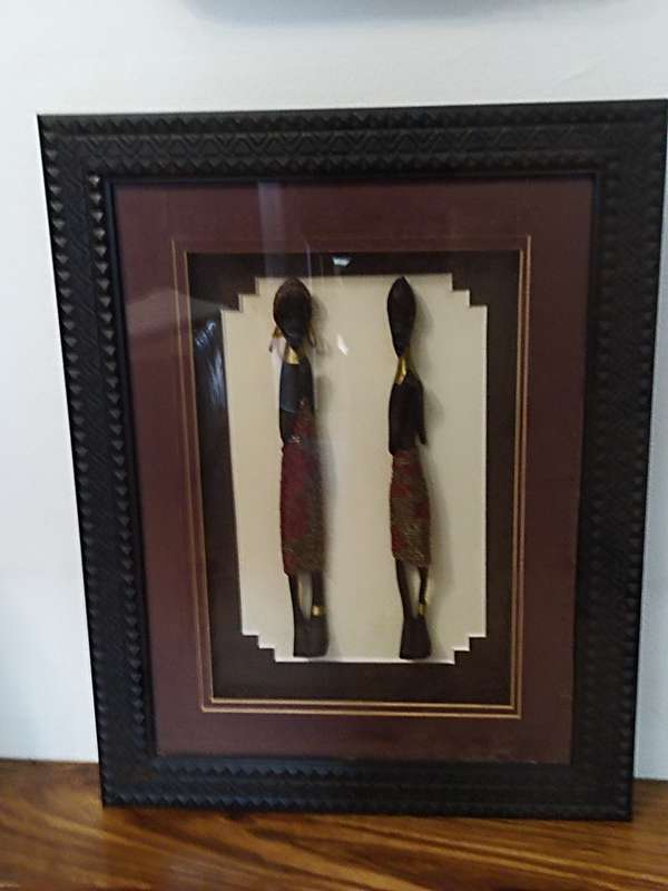 African carved figurines in a Box frame