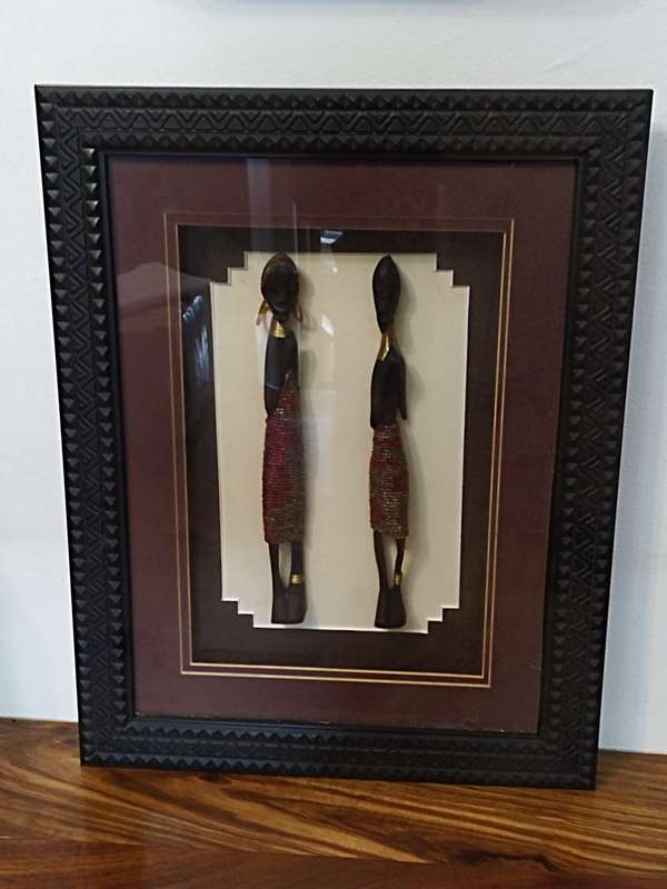 African carved figurines in a Box frame