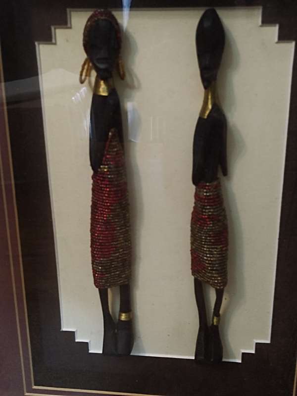 African carved figurines in a Box frame