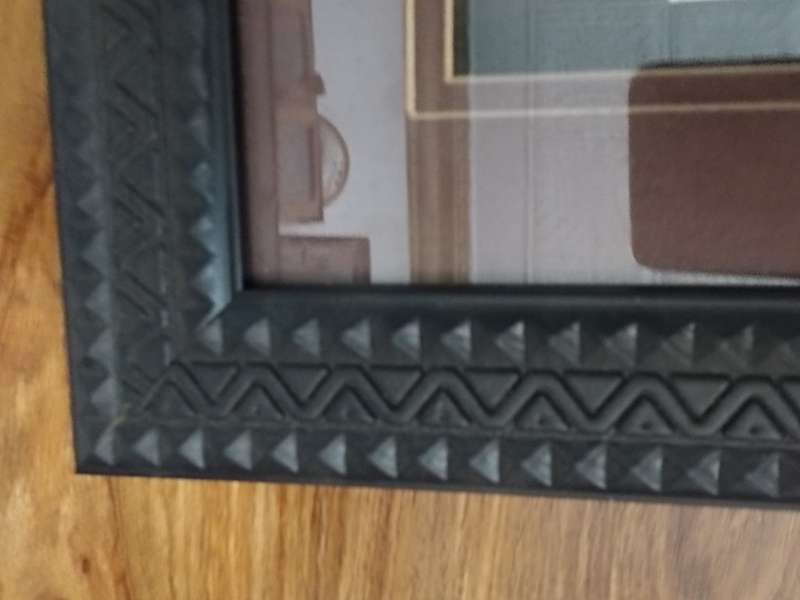 African carved figurines in a Box frame