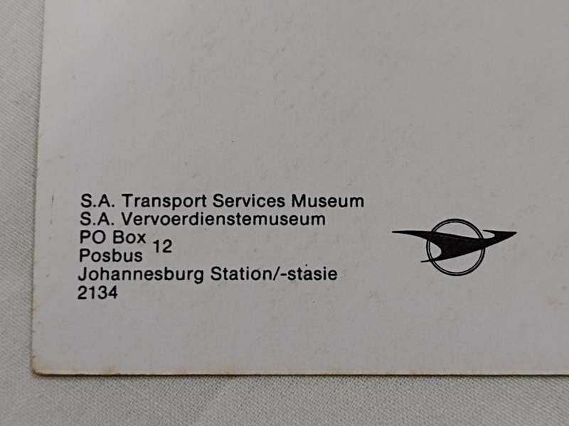 A Class 16E locomotive departing Bloemfontein postcard