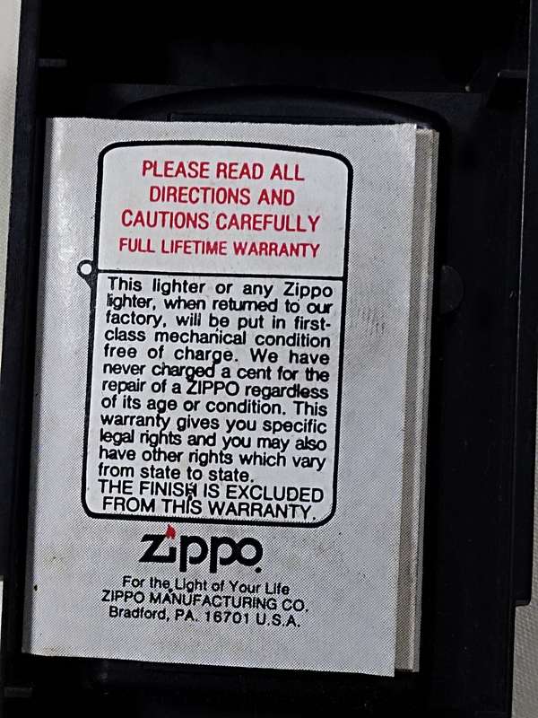 The Volcano club Zippo lighter