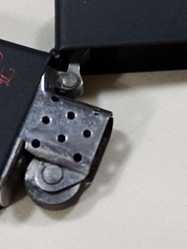 The Volcano club Zippo lighter