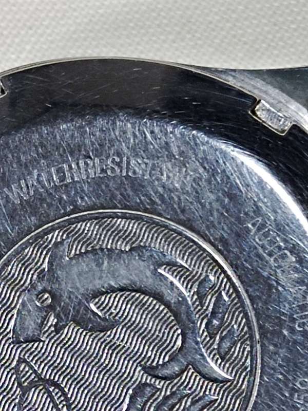 Enicar watch casing with strap