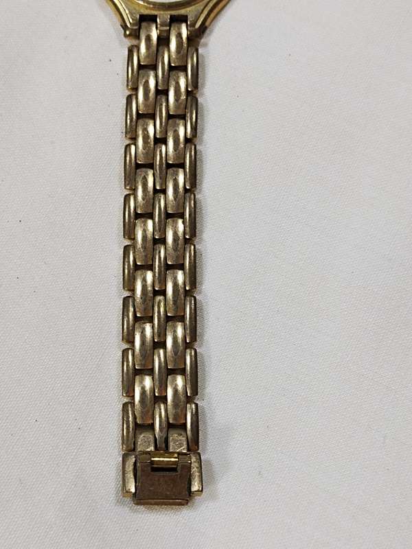 Watch casing with strap