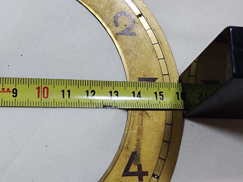 Gold tone clock dial