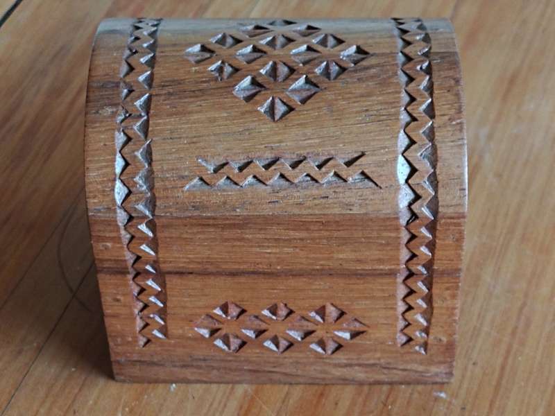 Small wooden box with secret lock