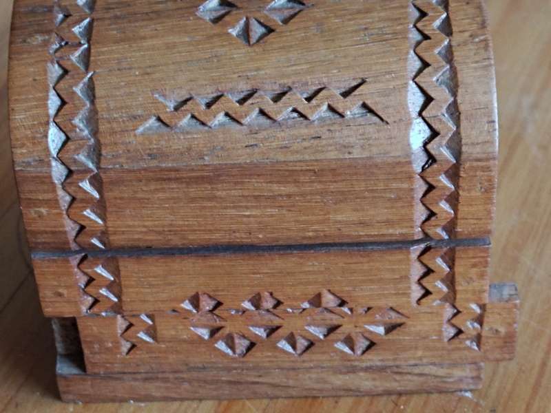 Small wooden box with secret lock