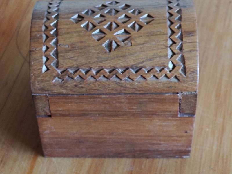 Small wooden box with secret lock