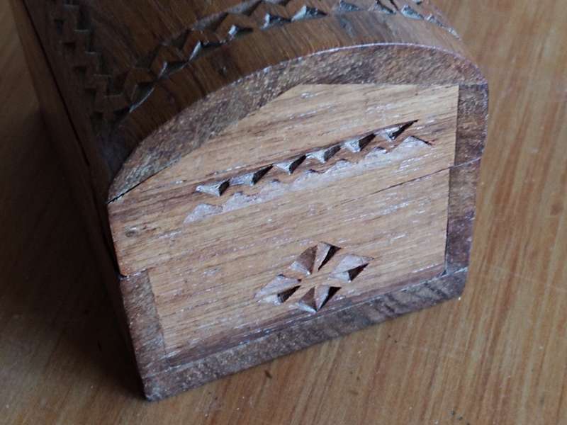 Small wooden box with secret lock