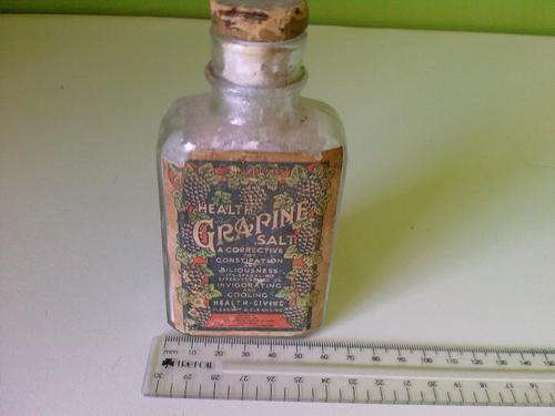 AN OLD PHARMECY BOTTLE