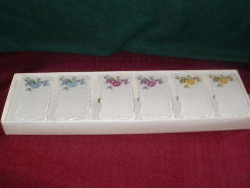 PORCELAIN PLACE SETTINGS, BOXED