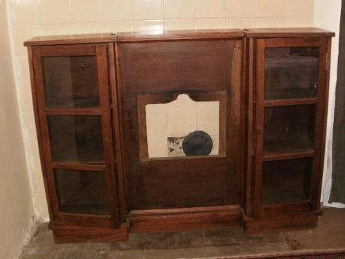 TEAK SHOWCASE WITH HEATER SPACE IN THE CENTER