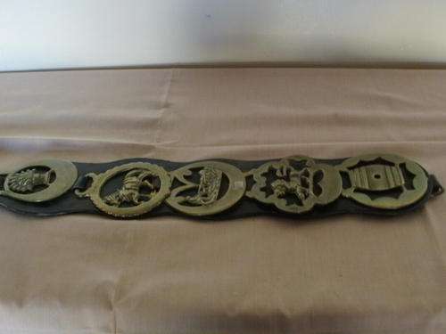 FIVE HORSE BRASSES