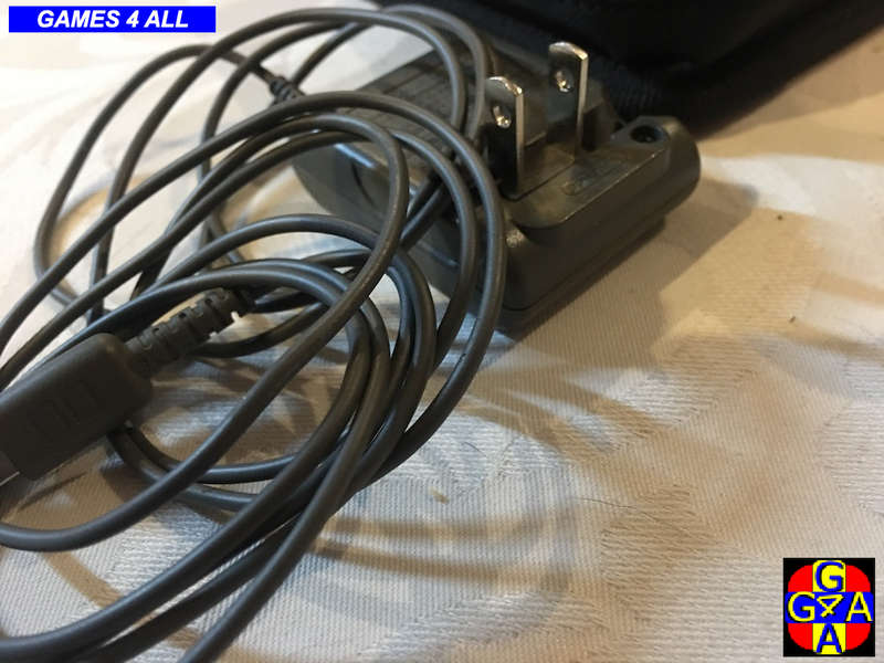 Nintendo DS + 6 Games + Charger + Bag