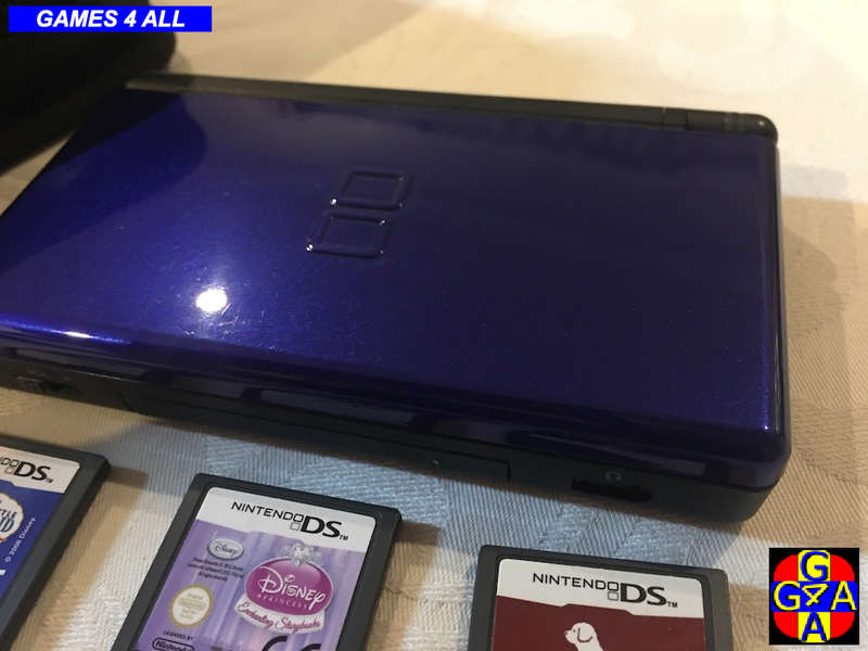 Nintendo DS + 6 Games + Charger + Bag