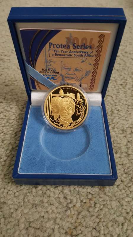 ###2004 Mandela 10 year democracy Protea 1oz gold###Cheapest on bob