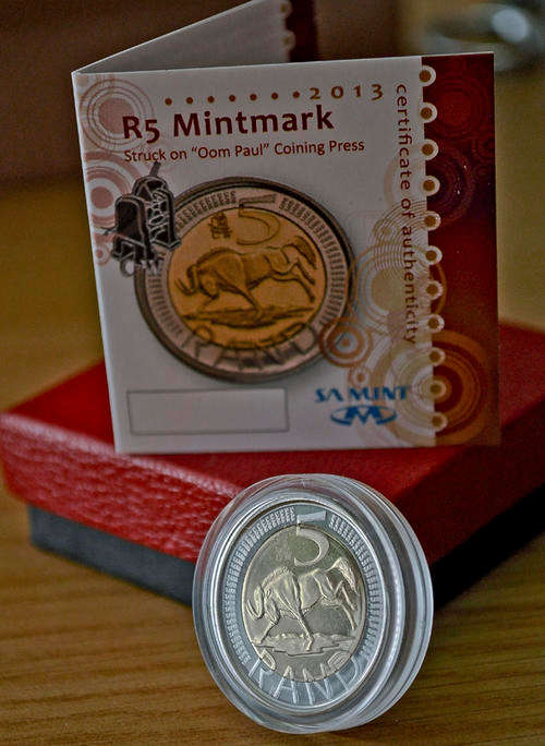 With FREE items!!!  2013 Oom Paul R5 Coin