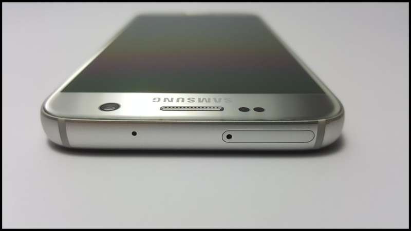 Samsung Galaxy S7 Duos Dual SIM | dbrand & Slickwraps Skins | Silver Titanium 32GB | Wireless Pad