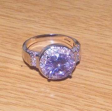 WHITE GOLD PLATED RING WITH LILAC CRYSTAL - STARTING @ R29.00