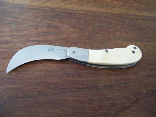 HAND MADE KNIFE WITH WALRUS IVORY HANDLE - VALUE R2500.00