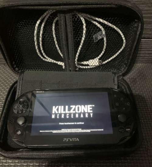 Sony PSVita console with Killzone Game and Hard case cover