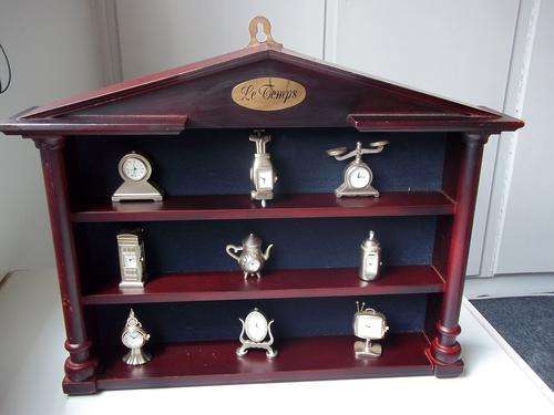 Wooden Rack with 9 Clocks
