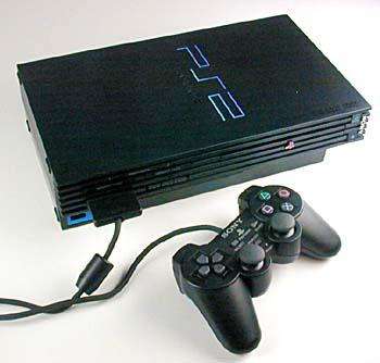 Playstation 2 Consale on Auction - with 2 Remotes and Accesories