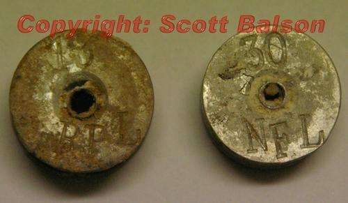 Extremely rare set of two RPL and NFL Larkan togt labour "bobbin" tokens