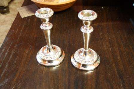 A Pair of Silver Plated candle sticks by Ianthe of England