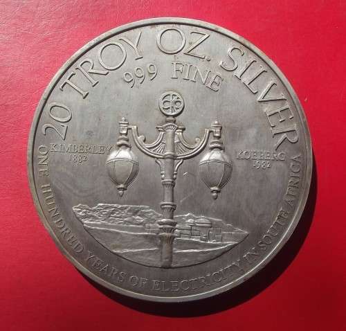 20 TROY OZ FINE SILVER - 100 YEARS ELECTRICITY. STAMPED ON RIM. BIG AND HEAVY!