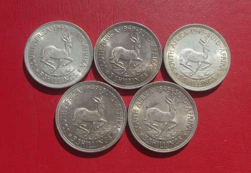 5 QUALITY 1949 SILVER 5 SHILLING COINS. 80% SILVER. BID IS PER COIN TO TAKE ALL.