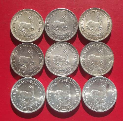 SET OF 9 X UNCIRCULATED SILVER CROWNS OF 1947/48/49. 80% SILVER. BID IS PER COIN TO TAKE 9.