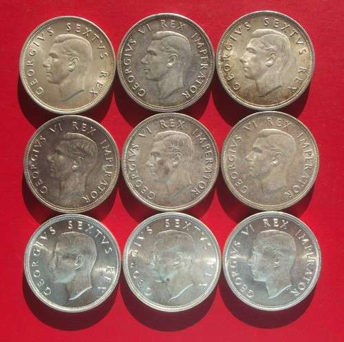 SET OF 9 X UNCIRCULATED SILVER CROWNS OF 1947/48/49. 80% SILVER. BID IS PER COIN TO TAKE 9.