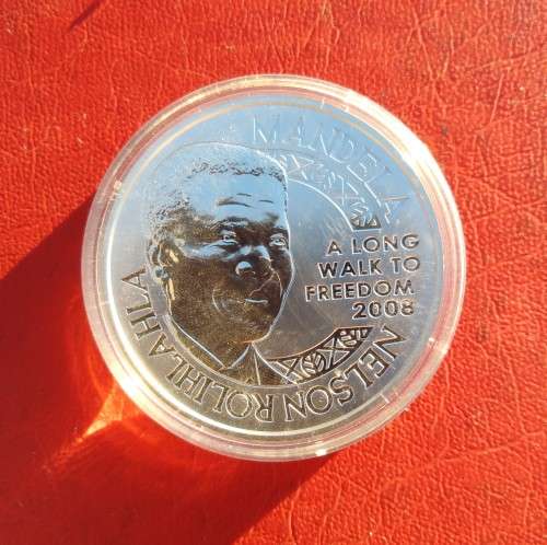 SILVER 1 OUNCE LIFE OF MANDELA MEDALLION. PROOF SEALED IN PLASTIC.