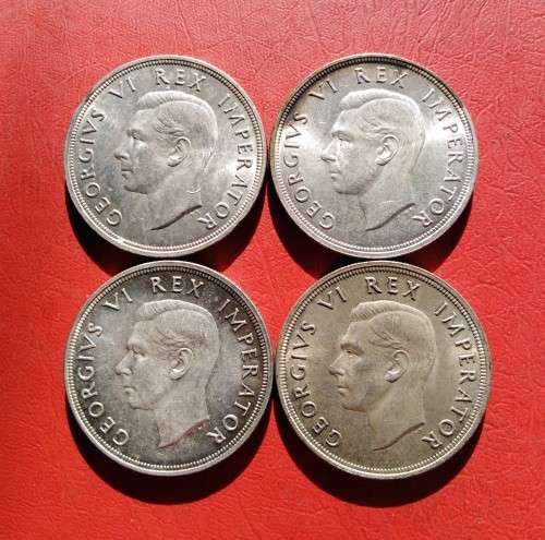 4 X 1947 SILVER CROWNS. 80% SILVER. AU TO UNC CONDITION. BID PER CROWN TO TAKE ALL.