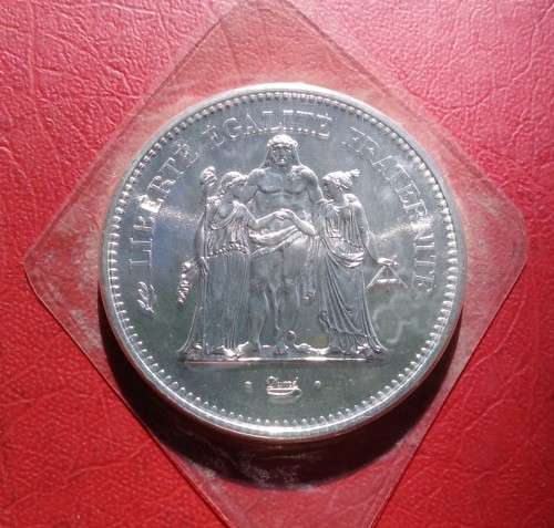 1977 SILVER (90%) 50 FRANCS. ORIGINALLY SEALED. MINT STATE CONDITION. 30 GRAMS. BIGGER THAN CROWN.