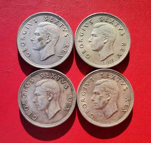 4 X SA UNION SILVER CROWNS IN CIRC CONDITION. 3 X 1952 + 1 X 1951. BID IS PER CROWN TO TAKE ALL 4.