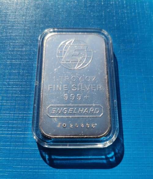 VERY SCARCE 1 OZ PURE SILVER ENGELHARD BAR SEALED IN PLASTIC WITH SERIAL NUMBER.