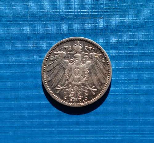 1909 GERMAN REICH SILVER 1 MARK COIN. 5.5 GRAMS OF 90% SILVER.